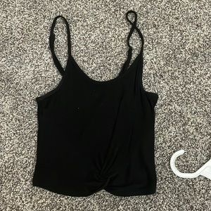 this is a small black cropped tank top